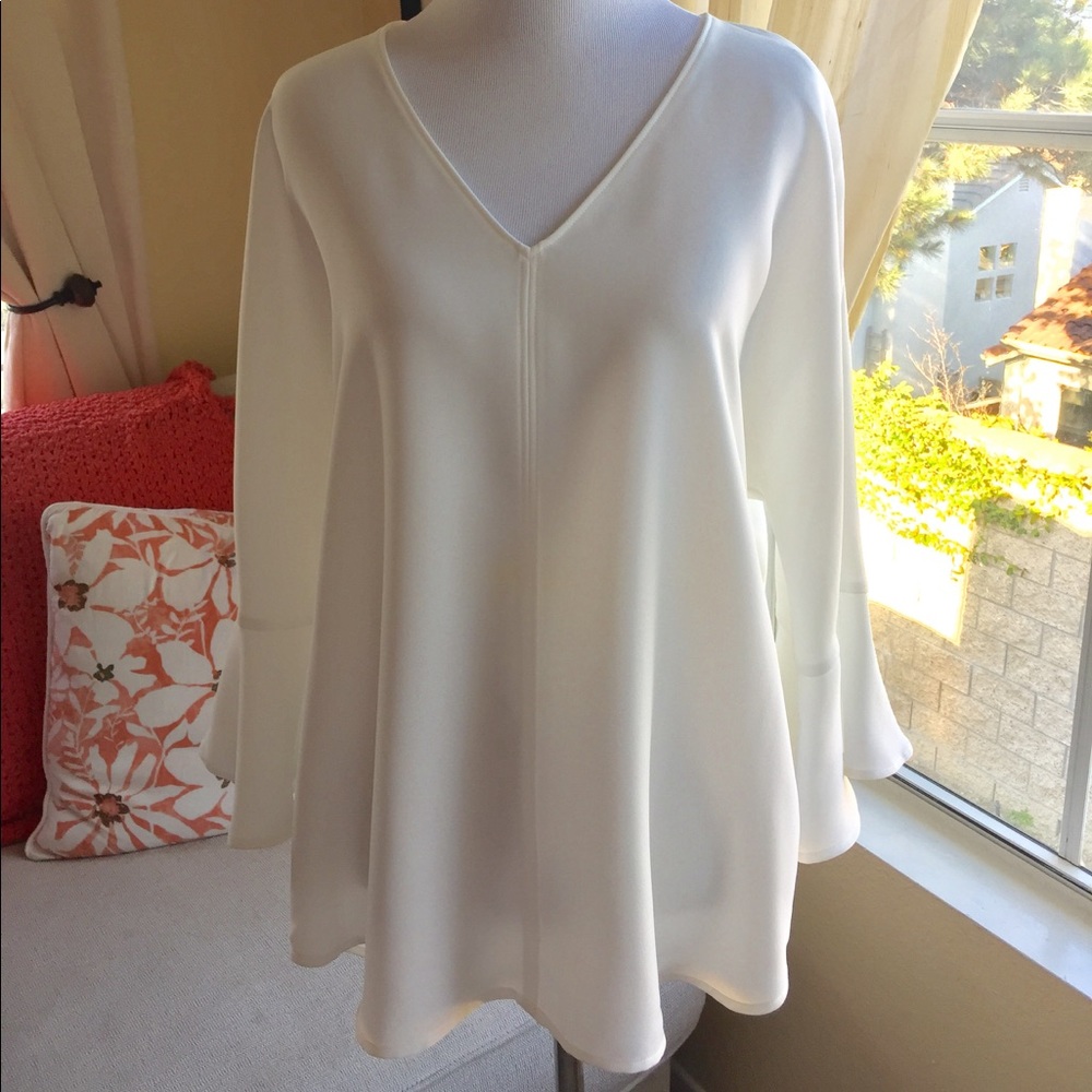 Beautiful top quality classic bell sleeve top..